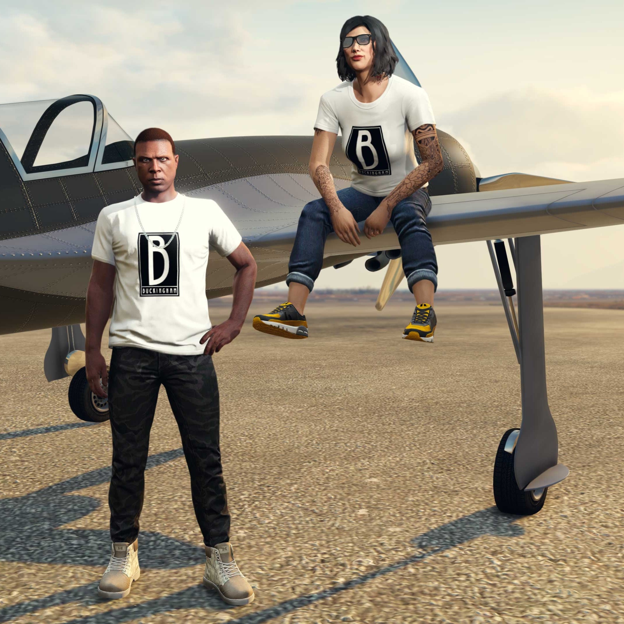 Buckingham Tee Screenshot of two GTA Online characters wearing the Buckingham Tee.