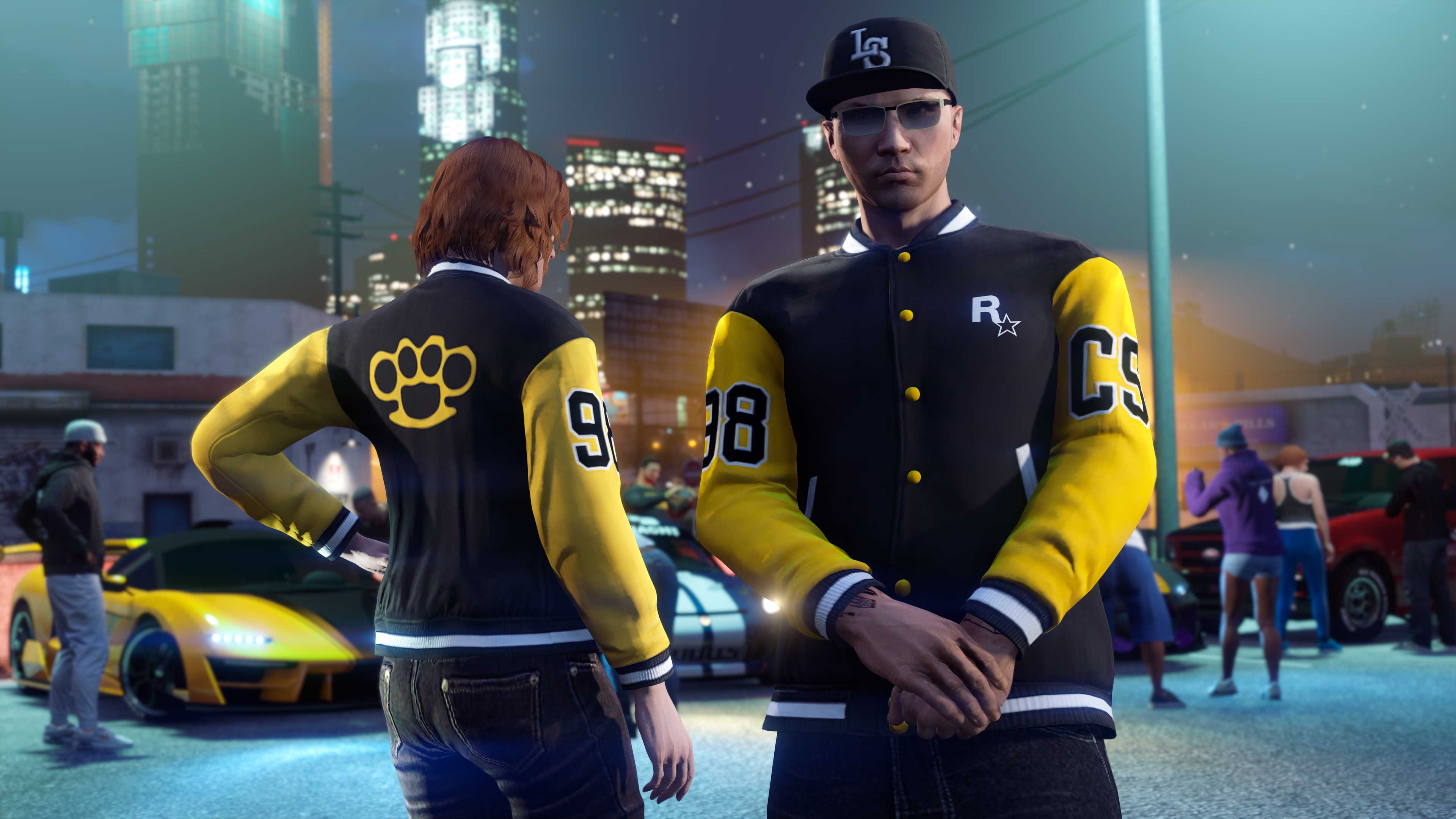Screenshot of two GTA Online characters wearing Community Series Varsity Jacket.