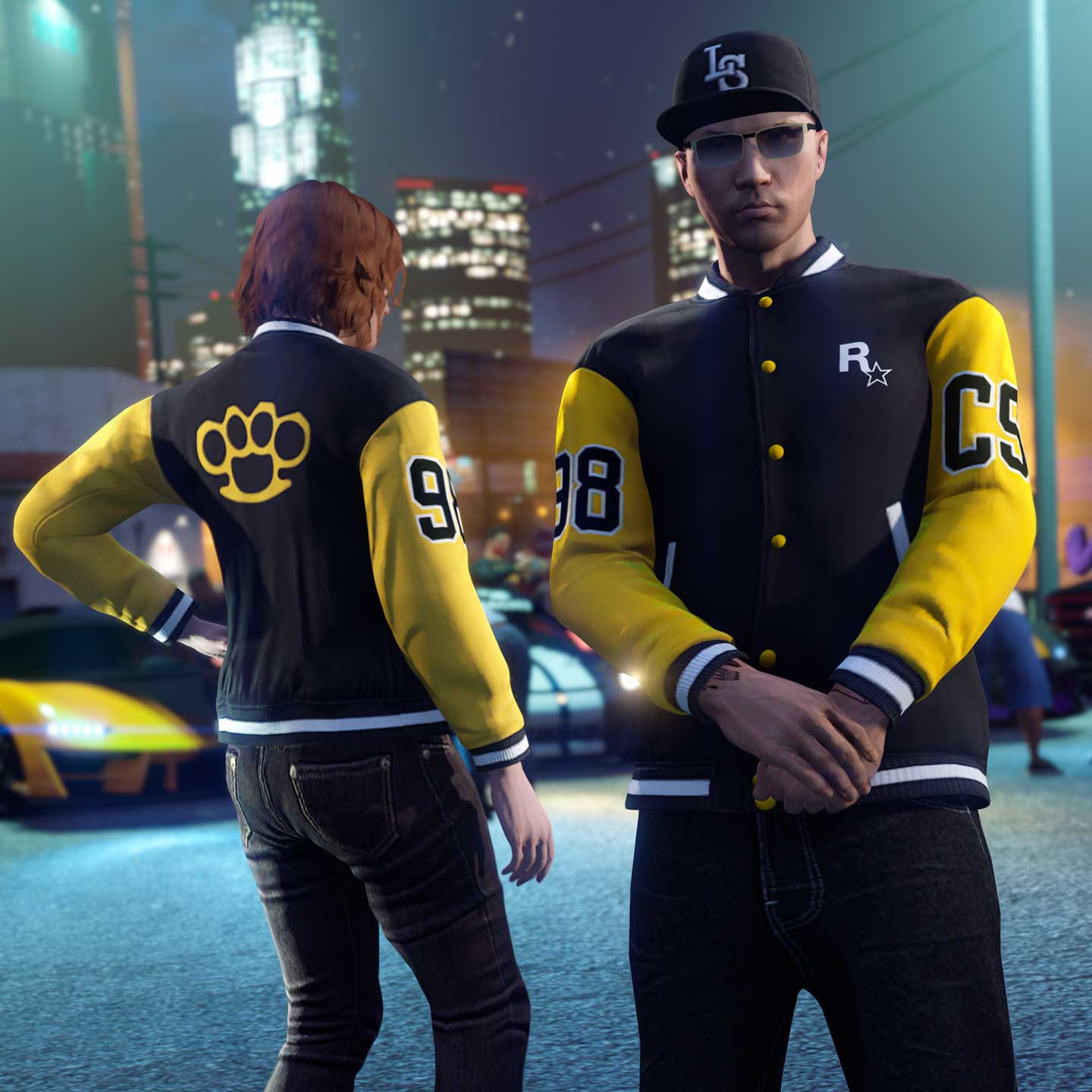 Screenshot of two GTA Online characters wearing Community Series Varsity Jacket.
