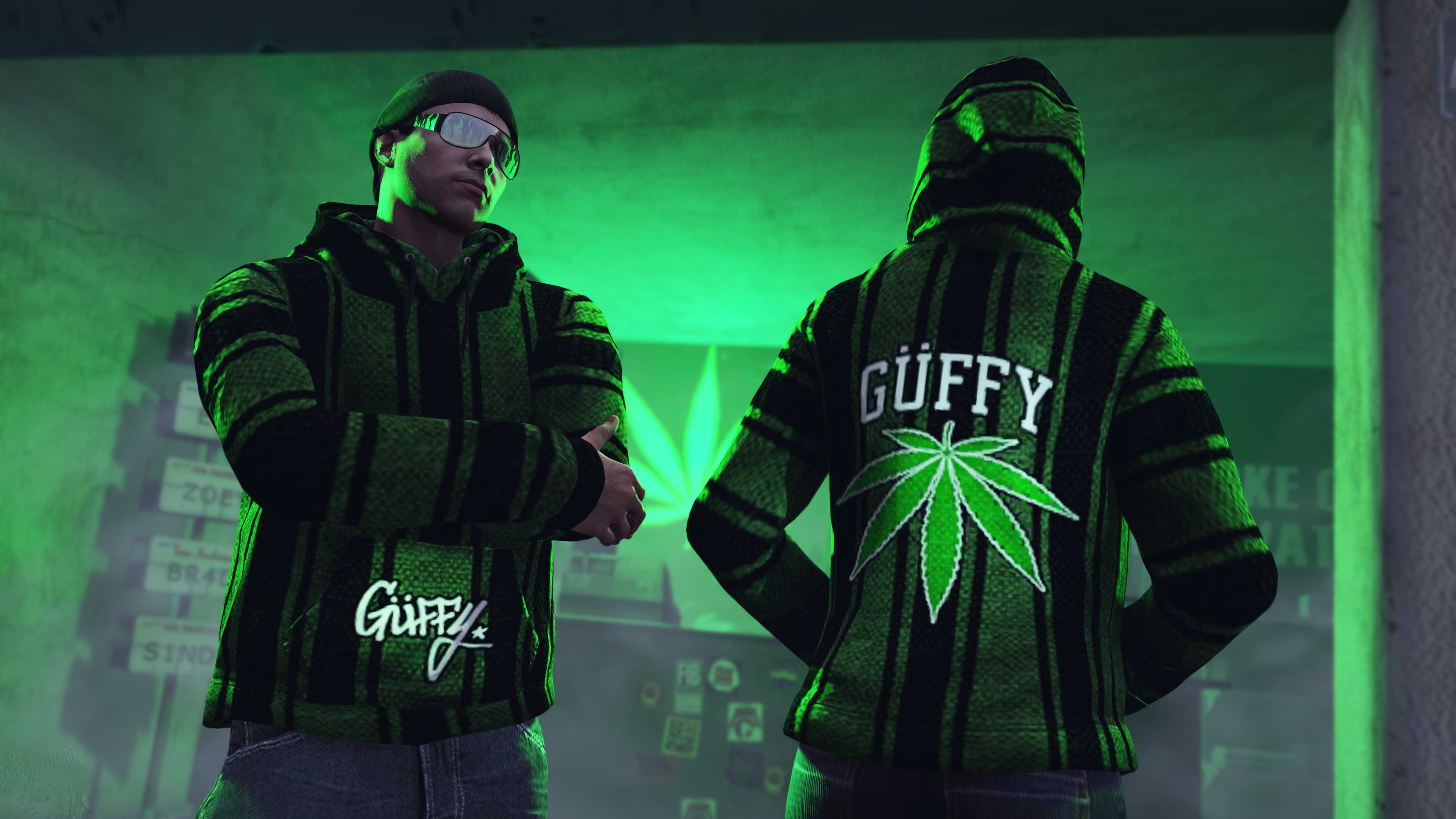 Güffy Drug Rug Hoodie Screenshot of two GTA Online characters wearing Güffy Drug Rug Hoodies.