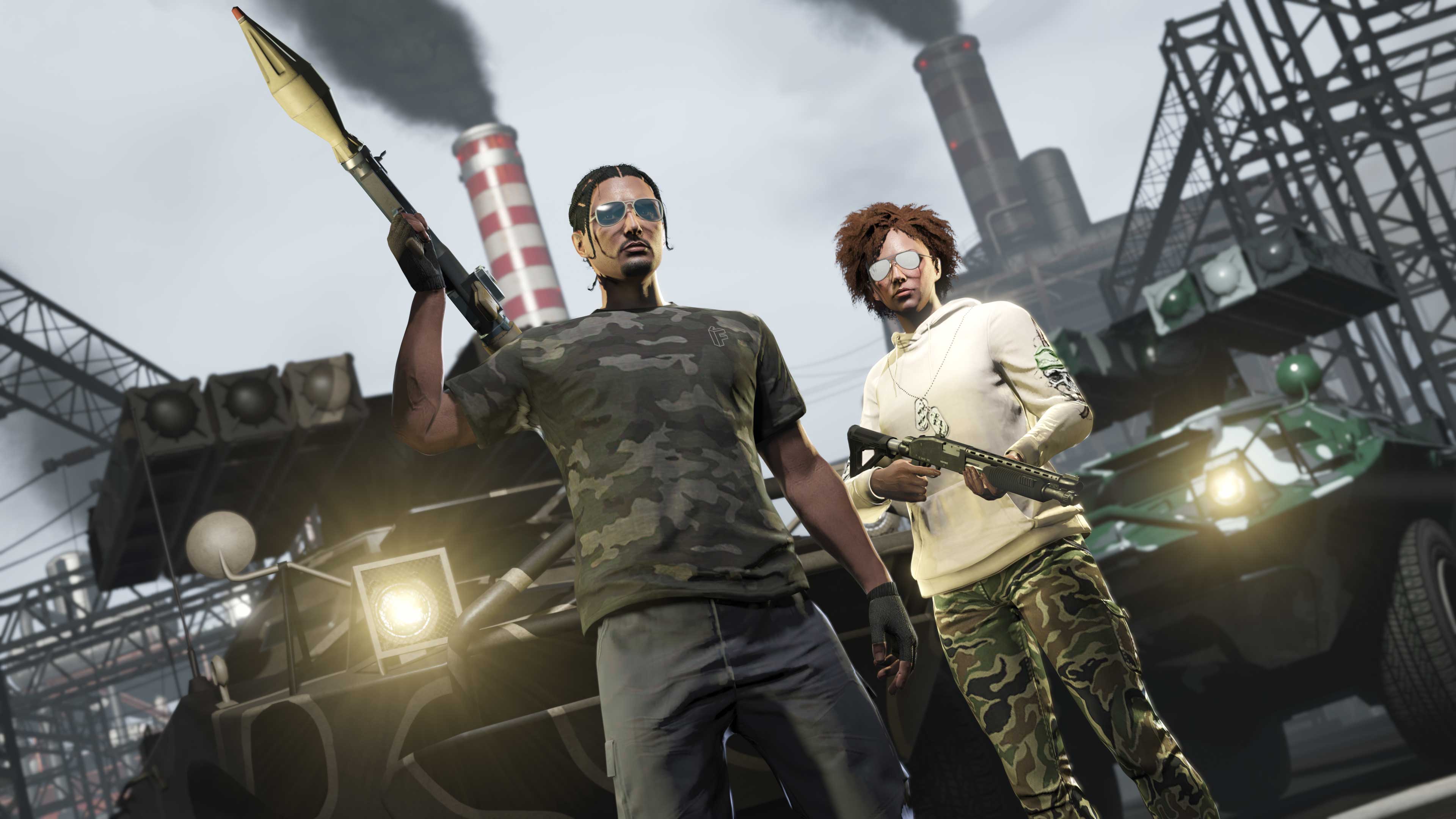 Screenshot of two GTA Online characters wearing Vom Feuer Camo Tee and Dollar Daggers Hoodie.