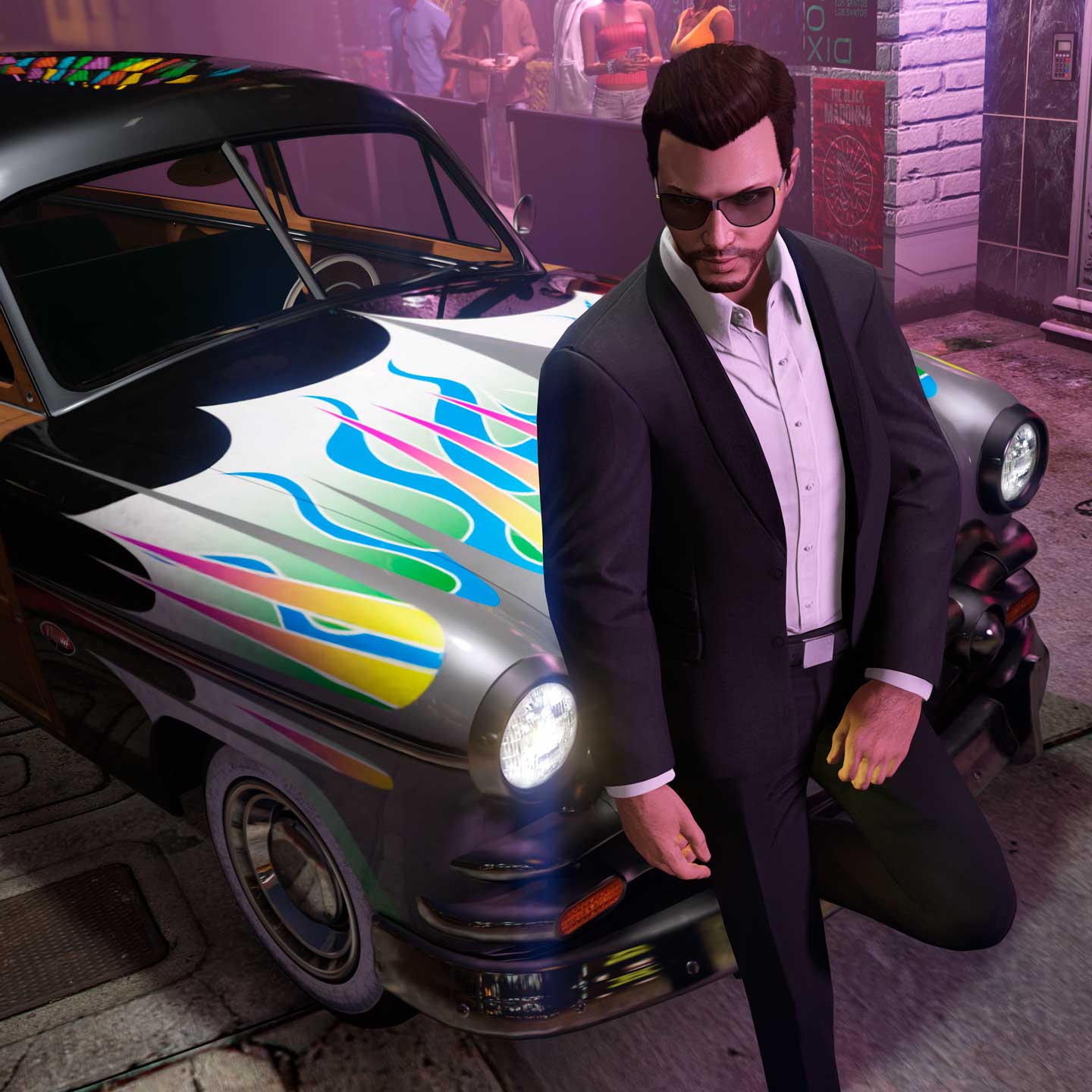 Screenshot of a GTA Online character and a Vapid Clique Wagon with a Pinned Flames Livery.